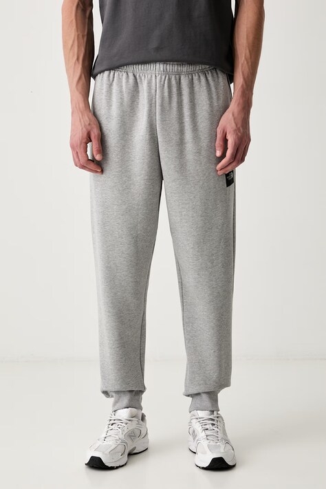 The North Face spodnie dresowe męskie z bawełną szare regular waist NF0A8JB0CQO1