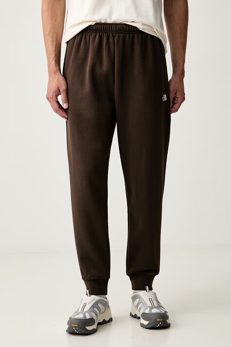 The North Face spodnie dresowe męskie z bawełną Evolution brązowe regular waist NF0A8CWYNMF1