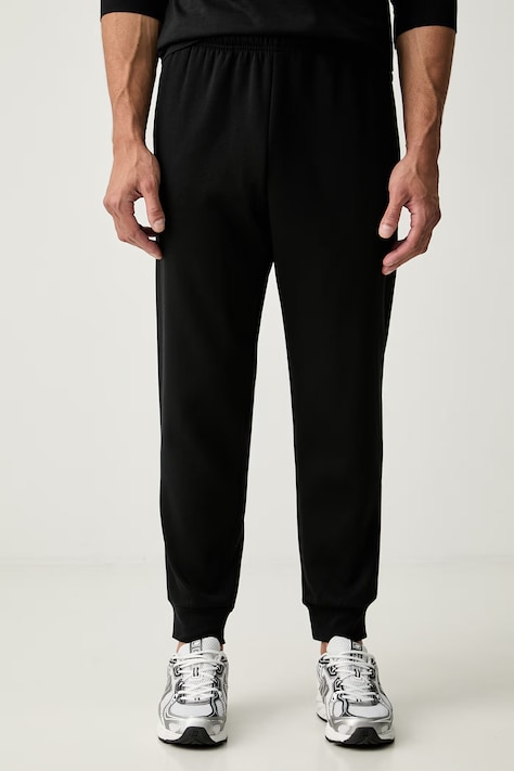 The North Face spodnie dresowe męskie z bawełną Evolution czarne regular waist NF0A8CWYJK31