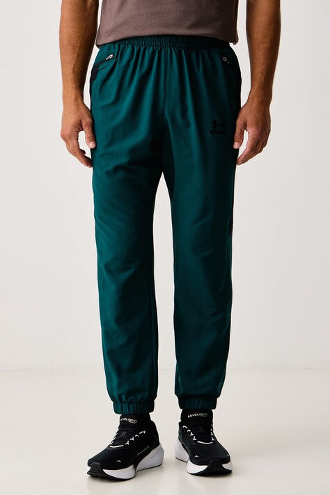 Under Armour Spodnie treningowe męskie Tech Sport zielone regular waist 6011268.919