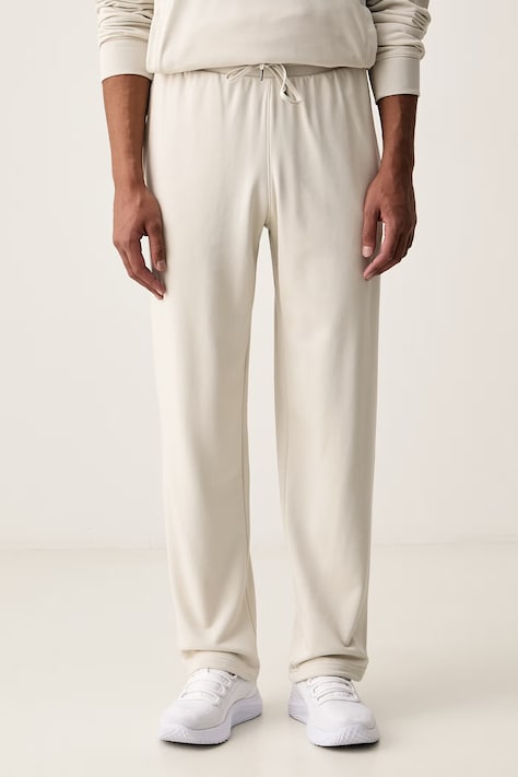 Under Armour Spodnie treningowe męskie z bawełną Rival beżowe regular waist 6009344