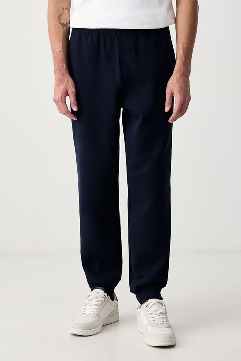 Lacoste Spodnie dresowe męskie z bawełną granatowe regular waist XH9455