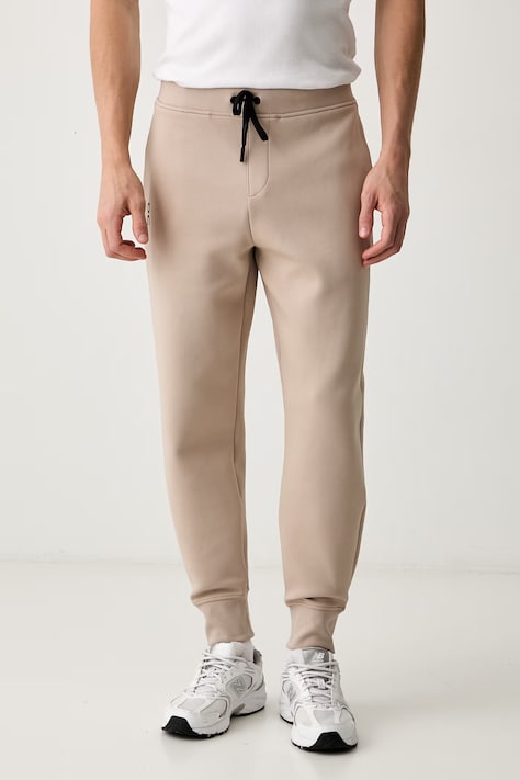On spodnie dresowe męskie z bawełną Focus Tech beżowe regular waist 1MF30320603