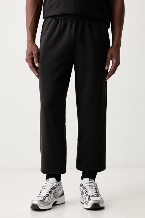 Puma spodnie dresowe męskie z bawełną McLaren czarne regular waist 637453