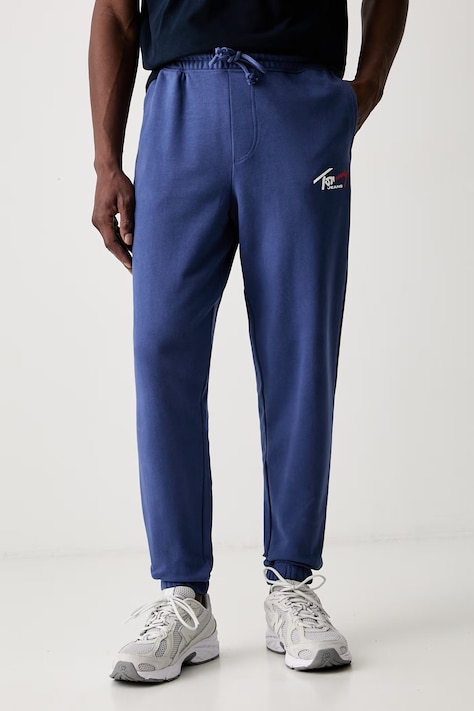 Tommy Jeans tepláky pánské bavlněné modré regular waist DM0DM23903