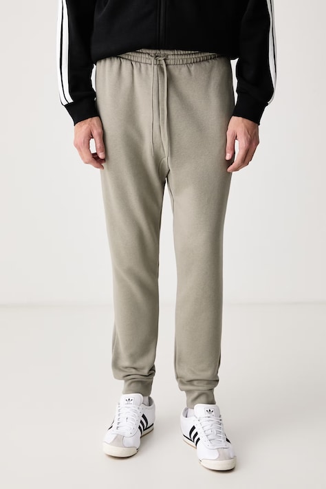 adidas Спортивні штани чоловічі з бавовною Essentials Feelcozy зелені regular waist KF2381
