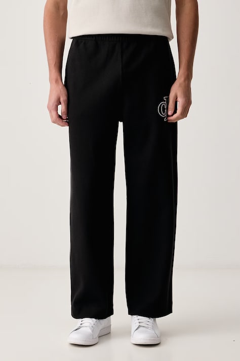 Calvin Klein Jeans Spodnie dresowe męskie z bawełną czarne regular waist LV04RH217G
