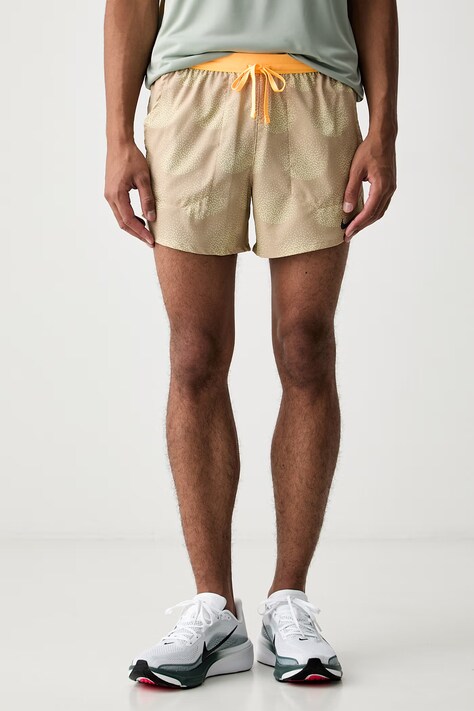 Nike szorty sportowe męskie Stride beżowe regular waist IO0530.286