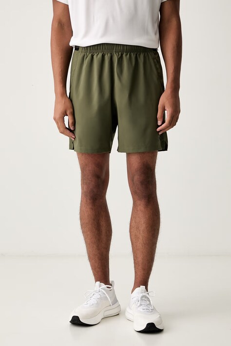 Under Armour szorty sportowe męskie Vanish Woven zielone regular waist 6009865.390
