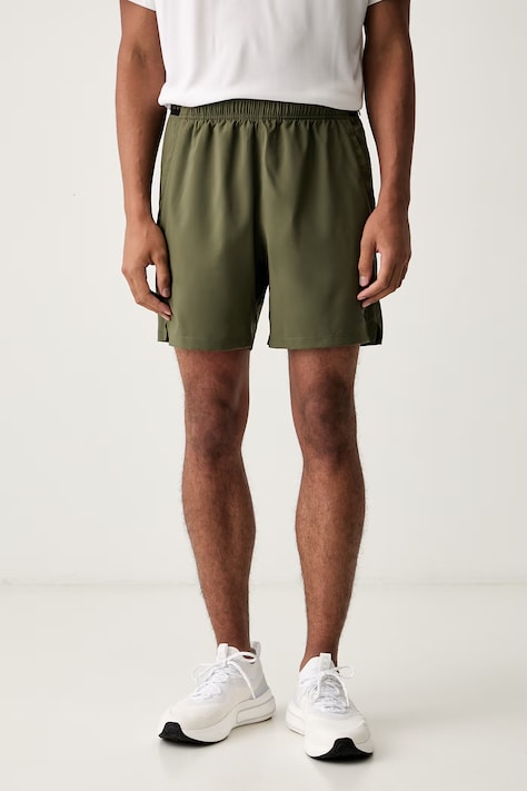 Under Armour szorty sportowe męskie Vanish Woven zielone regular waist 6009865.390