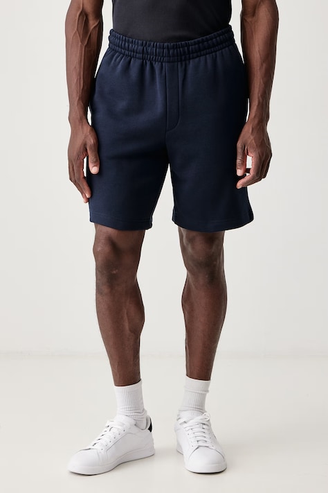 Lacoste Teplákové šortky pánske s bavlnou tmavomodré regular waist GH8861