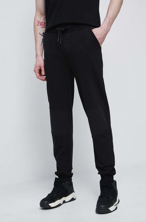 Spodnie dresowe męskie gładkie kolor czarny