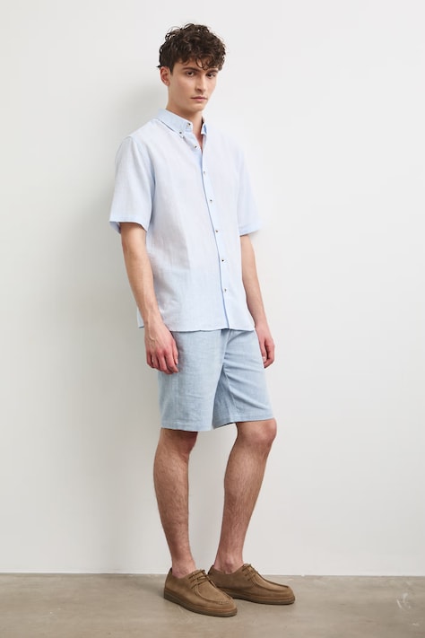 Medicine camicia di lino colore blu