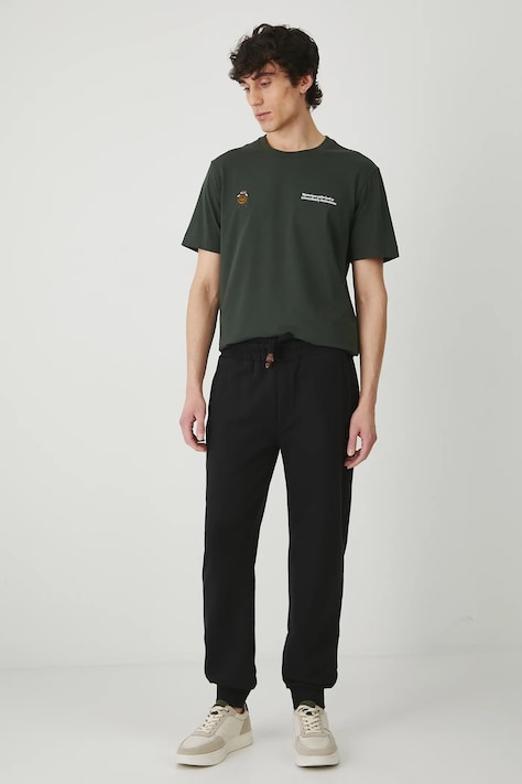 Donji dio trenirke Medicine za muškarce, boja: crna, bez uzorka