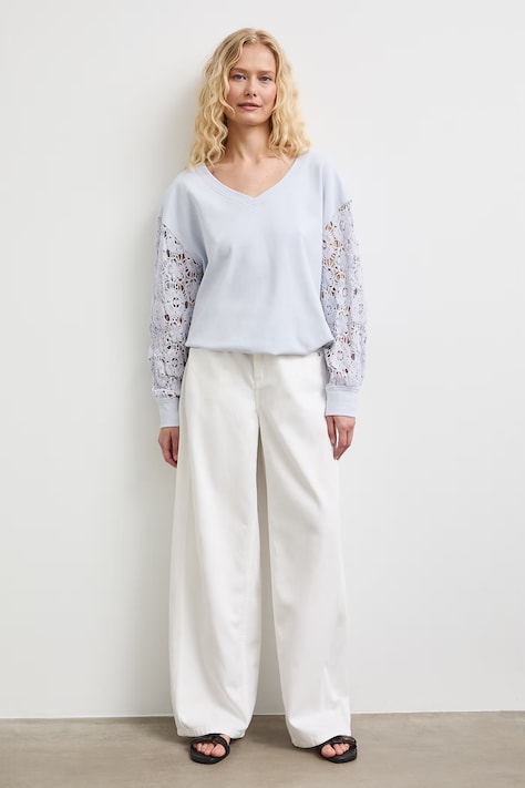 Bluza damska z ażurowymi wstawkami niebieska RS26-BLDB01