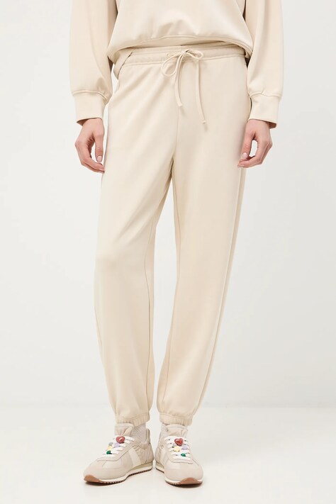 Medicine spodnie dresowe damskie kolor beżowy gładkie