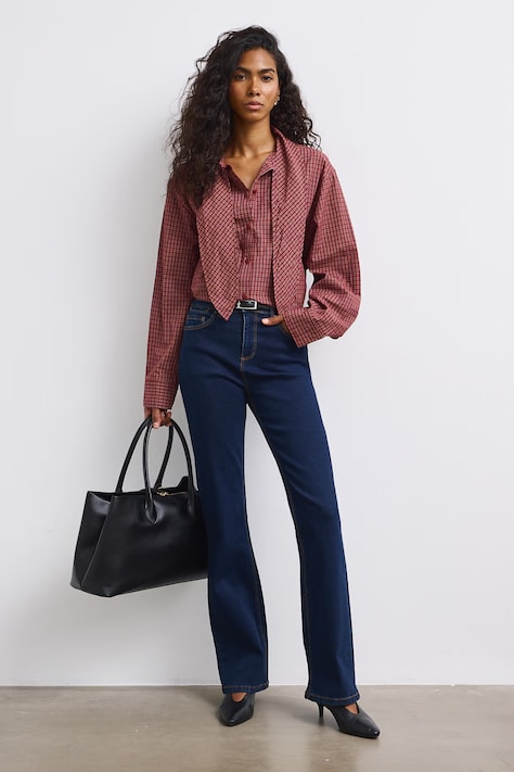Jeansy flare damskie z efektem sprania granatowe RW26-SJD501