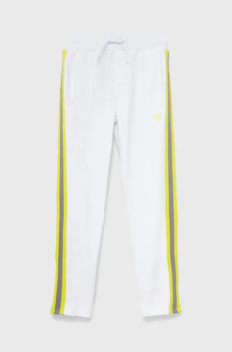 Dětské kalhoty Guess bílá barva, s aplikací