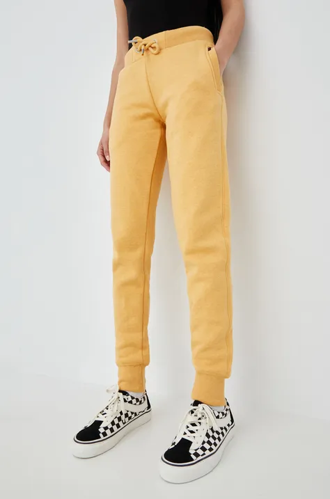 Superdry spodnie dresowe damskie kolor żółty melanżowe