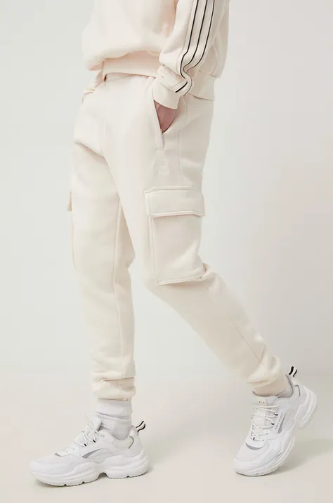 adidas Originals spodnie Adicolor HE6991 męskie kolor beżowy gładkie