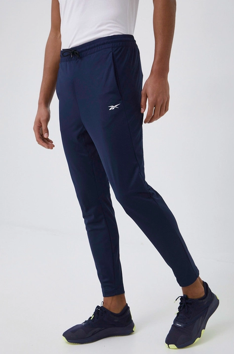 Reebok pantaloni de trening barbati, culoarea albastru marin, neted