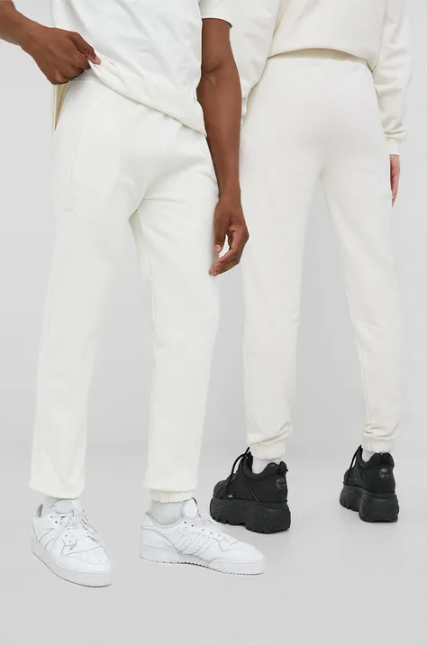 Arkk Copenhagen spodnie dresowe kolor biały gładkie