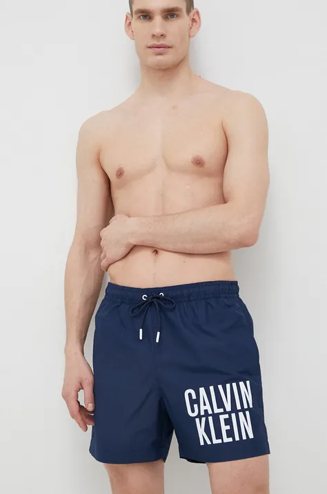 Plavkové šortky Calvin Klein tmavomodrá farba