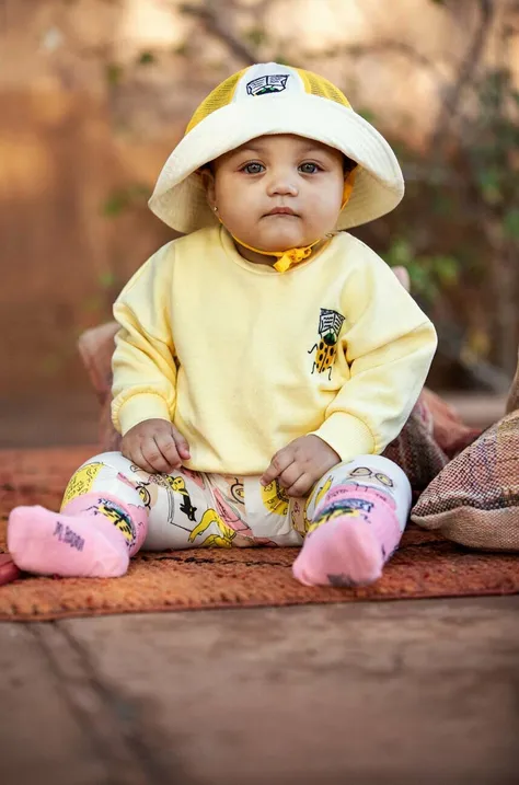 Detská bavlnená mikina Mini Rodini žltá farba, vzorovaná