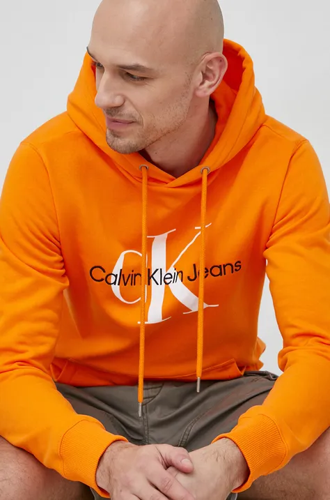 Bombažen pulover Calvin Klein Jeans moška, oranžna barva, s kapuco