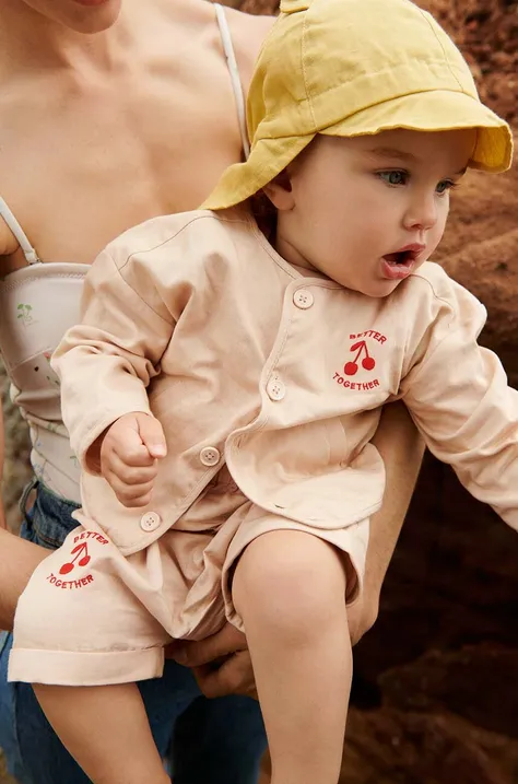 Дитяча шапка з домішкою льону Liewood колір бежевий однотонна