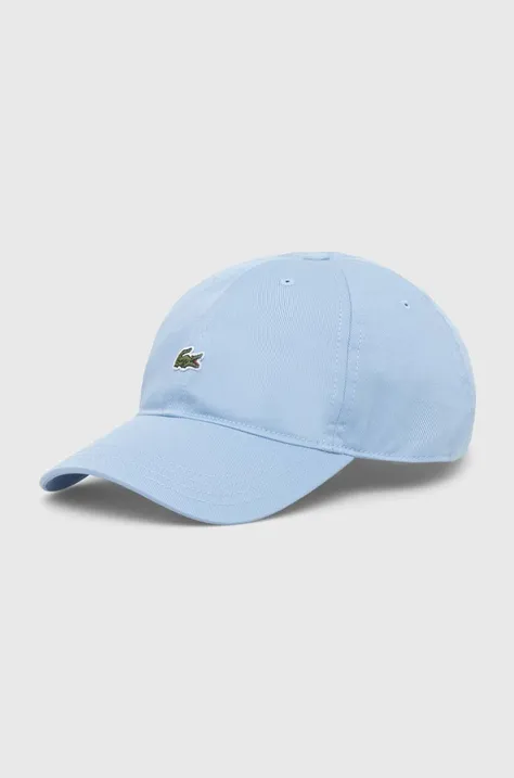 Памучна шапка с козирка Lacoste в синьо с апликация