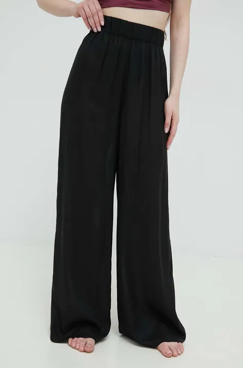 Nohavice Calvin Klein Dámske, čierna farba, široké, vysoký pás