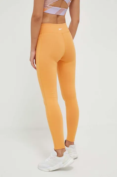 Reebok legginsy treningowe Lux kolor pomarańczowy gładkie