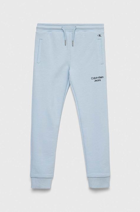 Calvin Klein Jeans spodnie dresowe dziecięce kolor niebieski gładkie