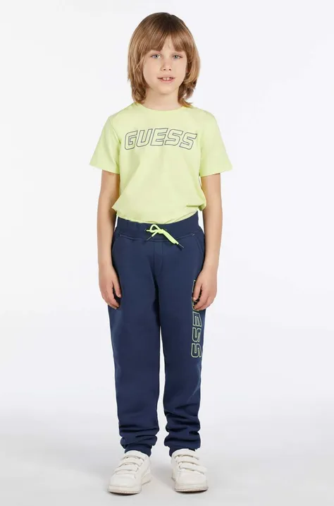Дитячі спортивні штани Guess колір синій з принтом