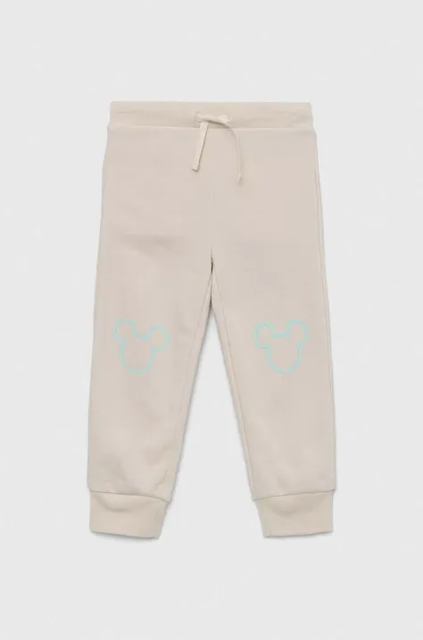 GAP pantaloni de trening pentru copii x Disney culoarea bej, cu imprimeu