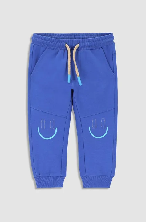 Дитячі спортивні штани Coccodrillo колір синій з принтом