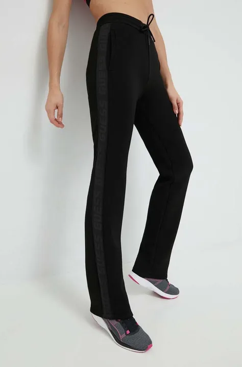 Спортивні штани Guess жіночі колір чорний з принтом