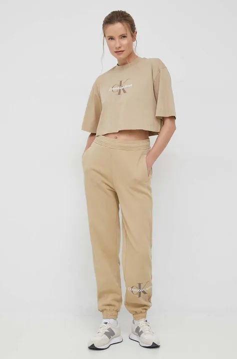 Calvin Klein Jeans pantaloni de trening femei, culoarea bej, cu imprimeu