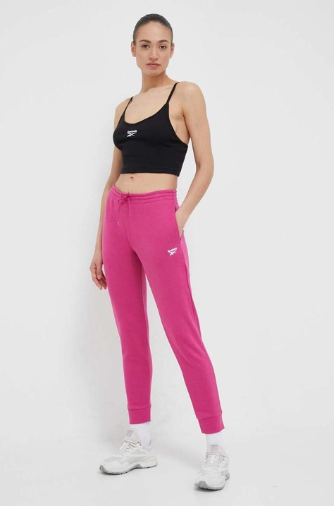 Reebok pantaloni de trening culoarea roz, neted