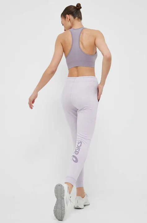 Asics spodnie dresowe kolor fioletowy z nadrukiem