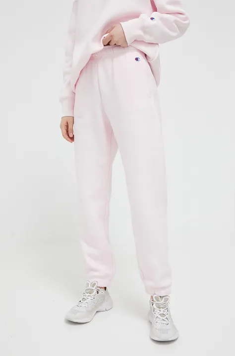Спортен панталон Champion в розово с изчистен дизайн