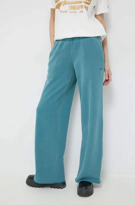Superdry spodnie dresowe kolor turkusowy gładkie