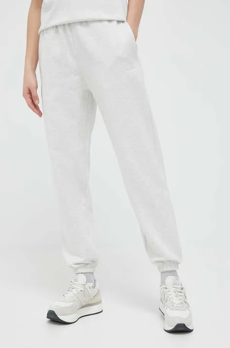 New Balance spodnie dresowe bawełniane kolor szary melanżowe