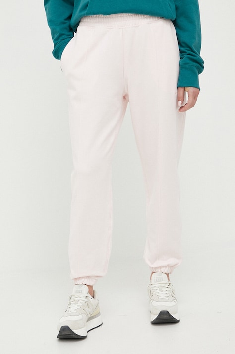 New Balance pantaloni de trening din bumbac culoarea roz, neted