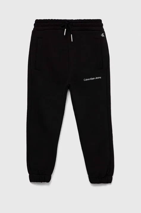 Calvin Klein Jeans pantaloni de trening pentru copii culoarea negru, neted