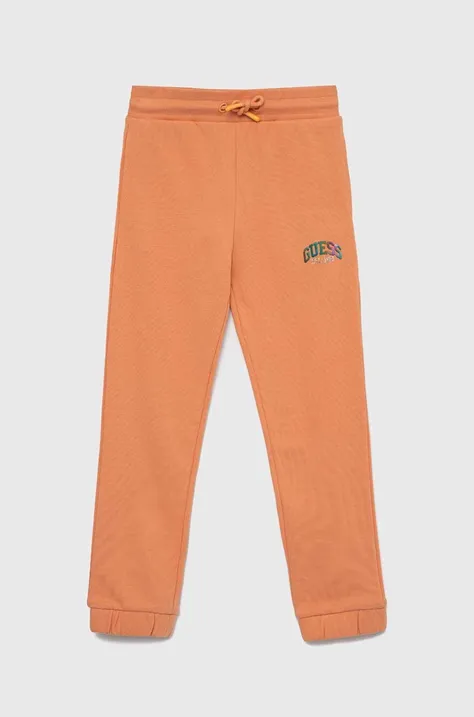 Guess pantaloni de trening din bumbac pentru copii culoarea portocaliu, neted