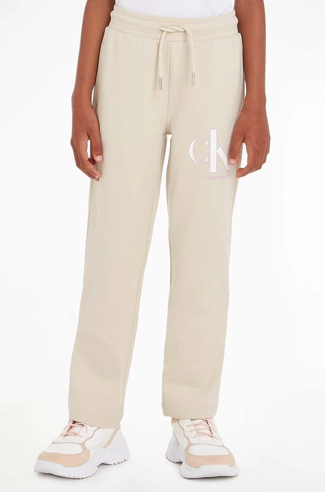 Calvin Klein Jeans pantaloni de trening pentru copii culoarea bej, modelator