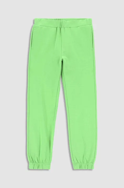 Coccodrillo spodnie dresowe bawełniane dziecięce kolor zielony gładkie