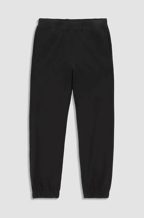Дитячі бавовняні штани Coccodrillo колір чорний однотонні